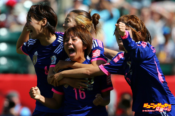 EDMONTON, AB - JUNE 27:  Mana Iwabuchi #16 of Japan celebrates with teammates after scoring a goal during the FIFA Women's World Cup Canada 2015 quarter final match between Japan and Australia at Commonwealth Stadium on June 27, 2015 in Edmonton, Alberta, Canada.  (Photo by Maddie Meyer - FIFA/FIFA via Getty Images)