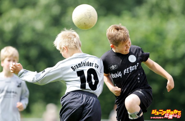 HAMBURG, GERMANY - JUNE 23:  Boys from the 9-11 year old age group go up for a header during the (DFB) German Football Association's E-Youth children's soccer tournament on June 23, 2007 in Hamburg, Germany.  (Photo by Martin Rose/Bongarts/Getty Images)