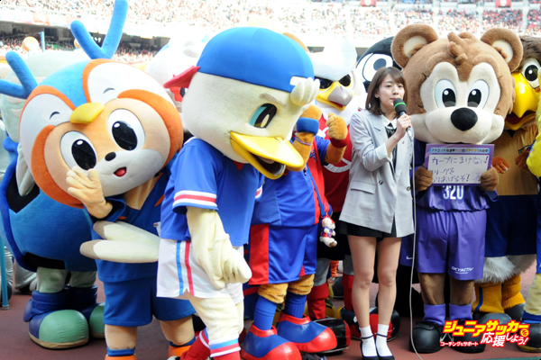 YOKOHAMA, JAPAN - FEBRUARY 28:  J.League female manager Miki Sato and mascots of J.League clubs are seen prior to the FUJI XEROX SUPER CUP 2015 match between Gamba Osaka and Urawa Red Diamonds at Nissan Stadium on February 28, 2015 in Yokohama, Kanagawa, Japan.  (Photo by Hiroki Watanabe/Getty Images)