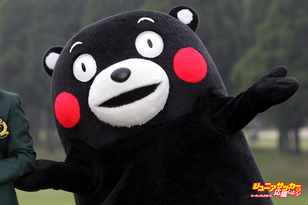 KIKUYO, JAPAN - APRIL 19: Erika Kikuchi of Japan lifts the trophy with Kumamoto prefecture's mascot Kumamon during a ceremony following the KKT Cup Vantelin Ladies Open at the Kumamoto Airport Country Club on April 19, 2015 in Kikuyo, Japan.  (Photo by Chung Sung-Jun/Getty Images)