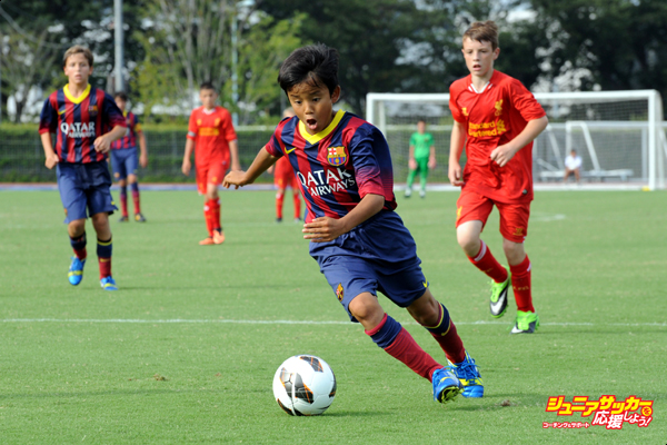 TOKYO, JAPAN - AUGUST 30: Takefusa Kubo of FC Barcelona in action during the U-12 Junior Soccer World Challenge 2013 final match between FC Barcelona and Liverpool FC at Ajinomoto Stadium on August 30, 2013 in Tokyo, Japan. (Photo by Etsuo Hara/Getty Images