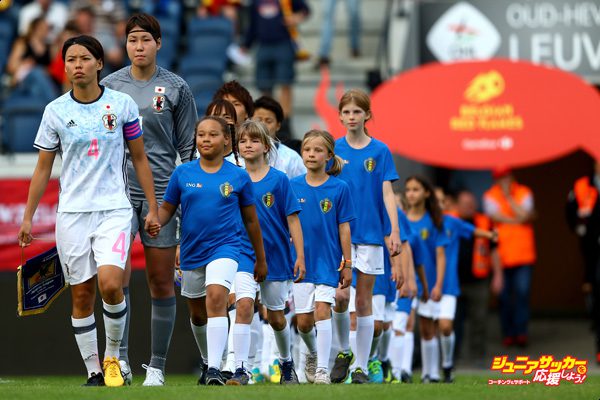 LEUVEN, BELGIUM - JUNE 13: The team of Japan with Saki Kumagai enters the pitch prior to the Women's International Friendly match between Belgium and Japan at Stadium Den Dreef on June 13, 2017 in Leuven, Belgium.  (Photo by Christof Koepsel/Getty Images)