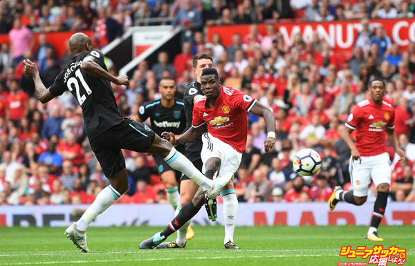 MANCHESTER, ENGLAND - AUGUST 13: Paul Pogba of Manchester United scores his sides fourth goal during the Premier League match between Manchester United and West Ham United at Old Trafford on August 13, 2017 in Manchester, England.  (Photo by Michael Regan/Getty Images)