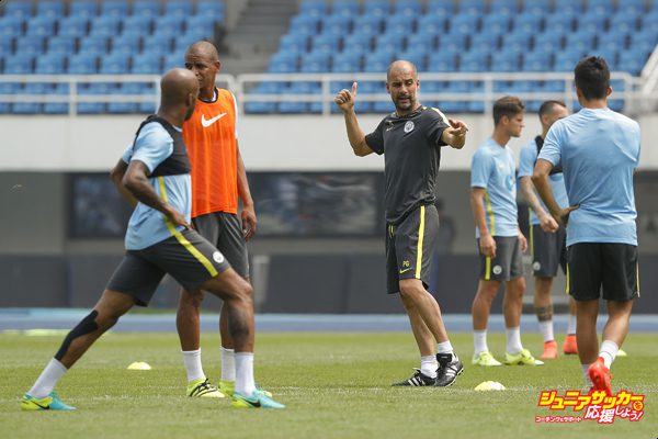 BEIJING, CHINA - JULY 24:  Manchester City's manager Pep Guardiola gestures during the pre-game training ahead of the 2016 International Champions Cup match between Manchester City and Manchester United at Olympic Sports Center Stadium on July 24, 2016 in Beijing, China.  (Photo by Lintao Zhang/Getty Images)